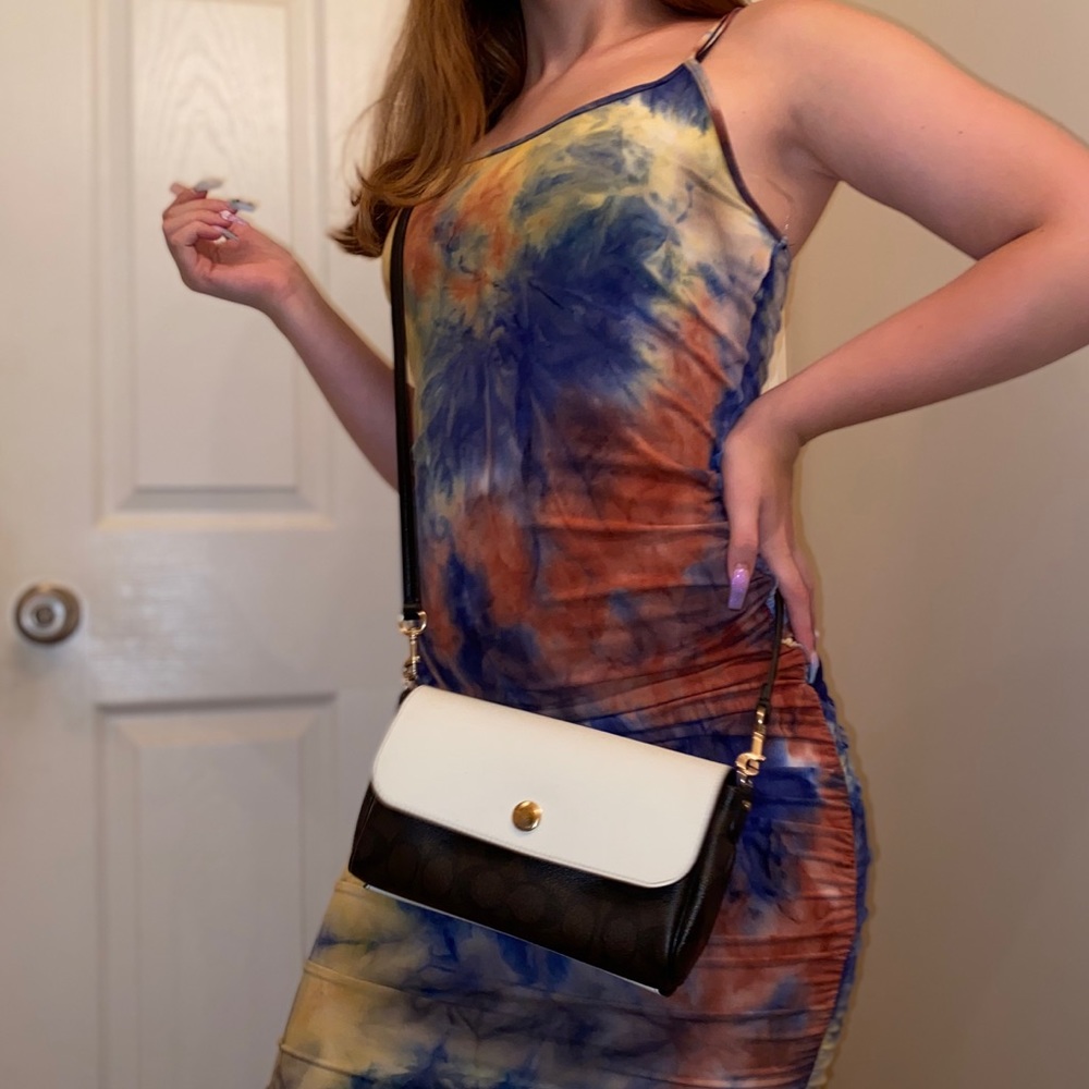 Reversible “Coach” crossbody clutch